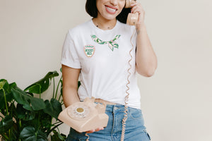 This Troop Beverly Hills scarf tee shirt is for the girl who wishes she could be Phyllis Nefler. You've seen other Troop Beverly Hills shirts, but this is an original, baby - the logo is inspired by the film and iconic Beverly Hills sign, and hand-drawn by Bonnie Bryant O'Connor, with a jaunty, trompe l'oeil, hand-drawn palm print scarf
