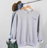 Our Salty sweatshirt is brand new for summer and ready to party. It features an embroidered dirty martini, embroidered oyster, and embroidered "SALTY" on the left chest. Wear it to a bonfire at your summer share in Nantucket or a beach party at Surf Lodge in Montauk. Original copyrighted design by Bonnie Bryant O'Connor.